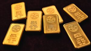 Een close-up van gouden baren op een fluweelzachte achtergrond.